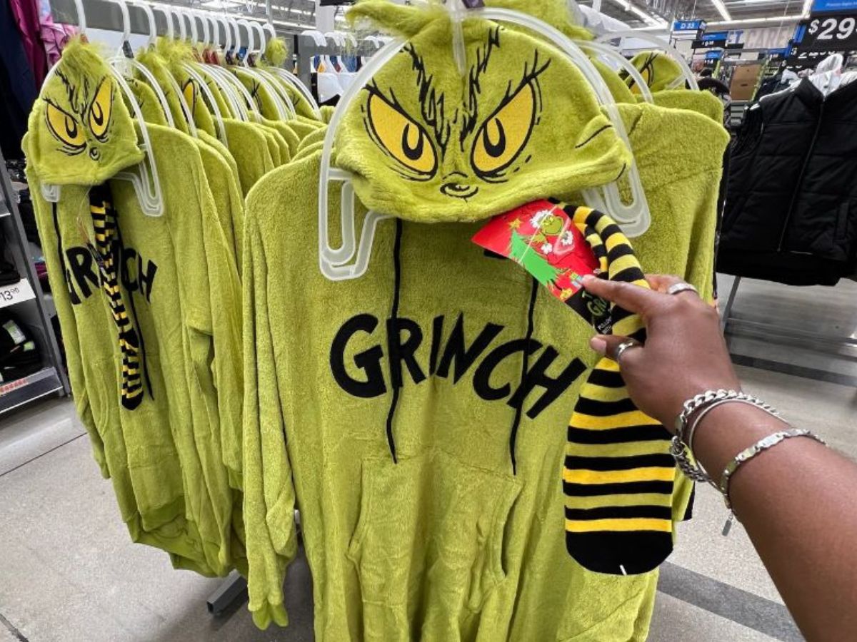 A rack of Grinch pullovers with knee socks attached