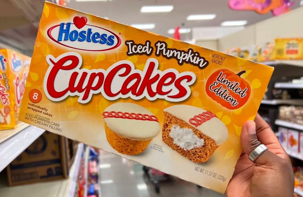 Hostess Iced Pumpkin Cupcakes 8 Count box in woman's hand at Target