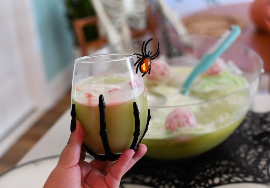 halloween beverage in a skeleton wine tumbler