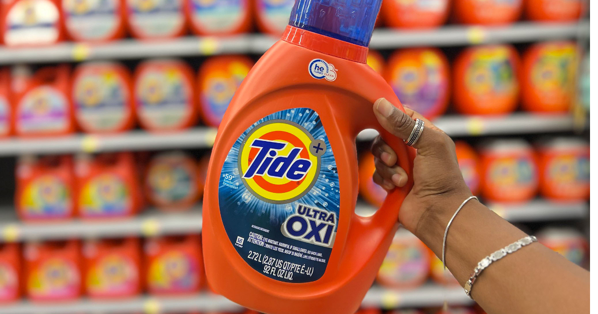 Hand holding Tide Ultra OXI