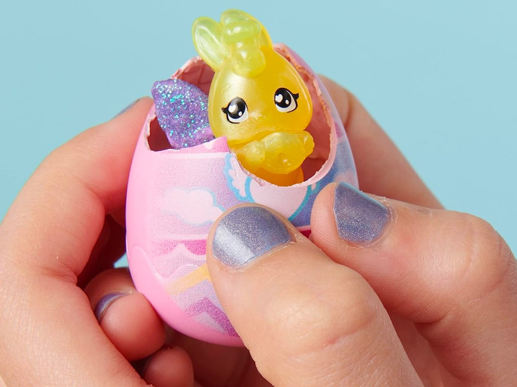 Hatchimal egg being held by a little girl
