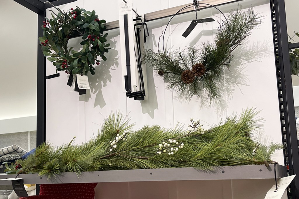 wreaths and garland on display at store