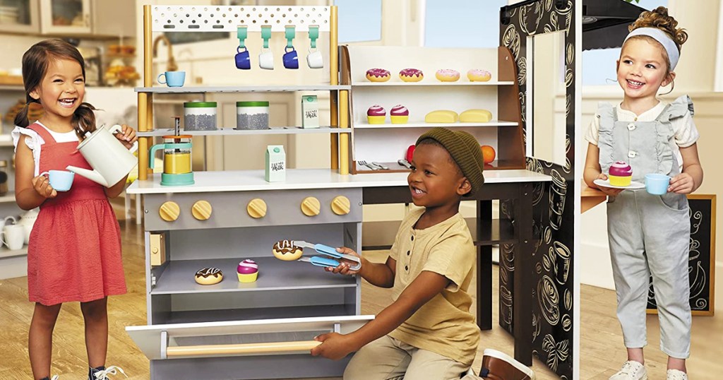 kids standing around little tikes bakery and cafe playset