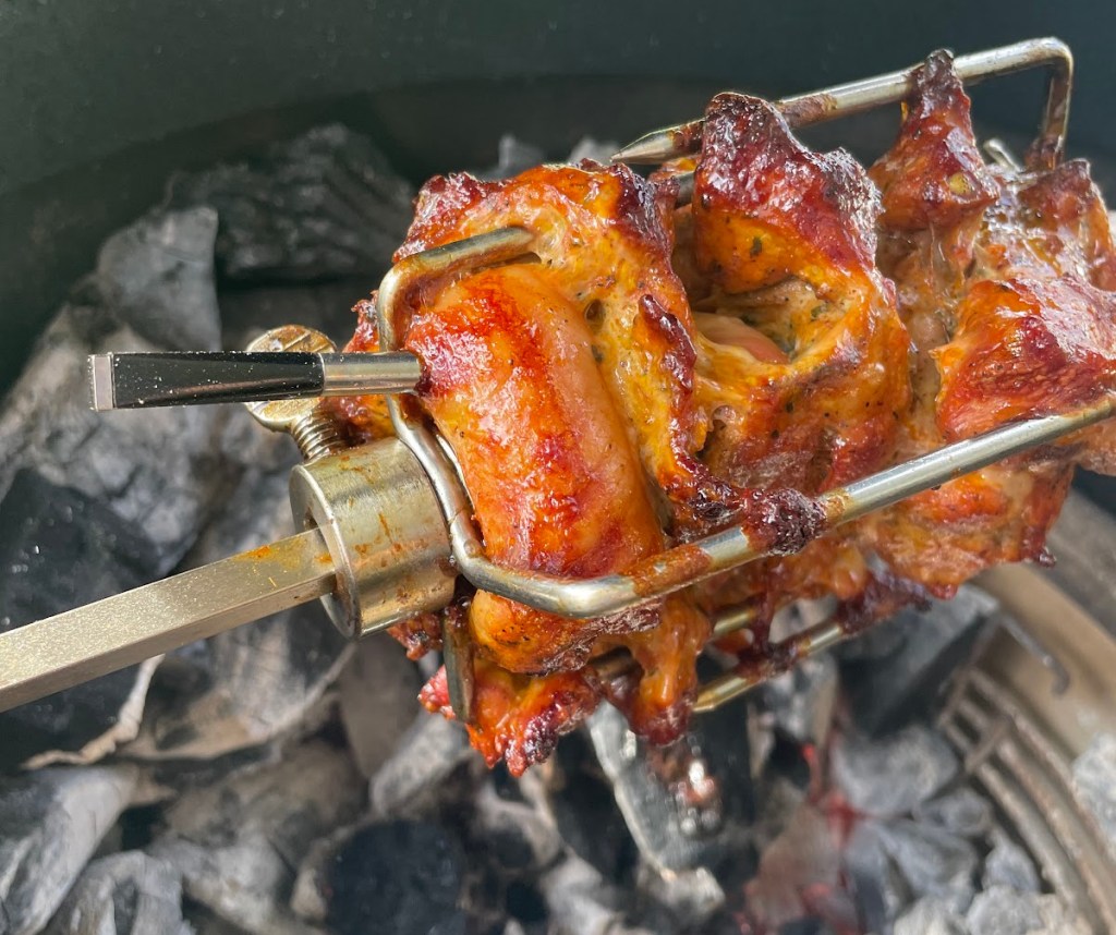 The MEATER meat thermometer, shown here in a piece of meat on the grill, is one of the best kitchen gadgets to own