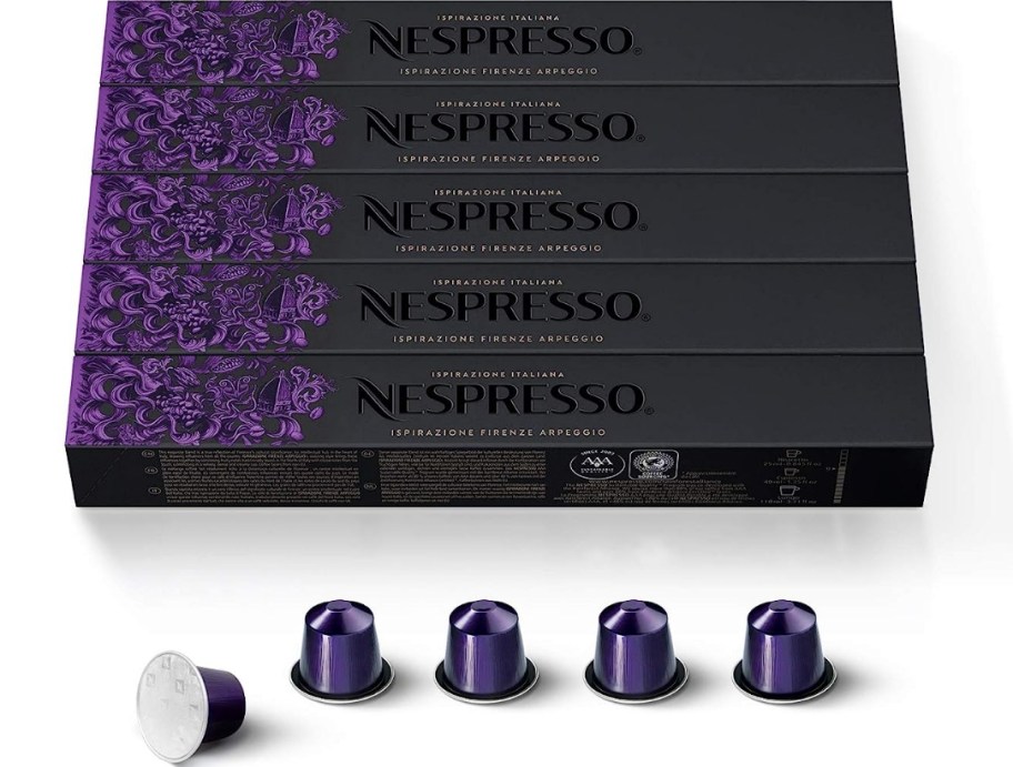 Boxes of Nespresso capsules with a row of capsules beneath it