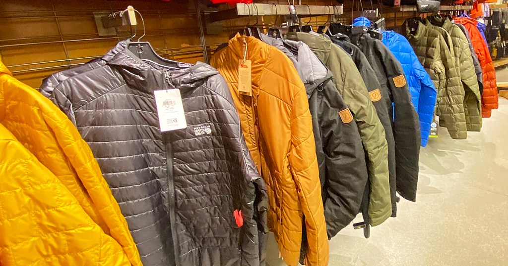 jackets on display racks in store