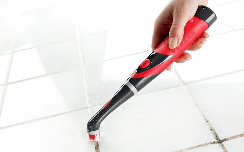 Rubbermaid Reveal Cordless Battery Power Scrubber cleaning tile