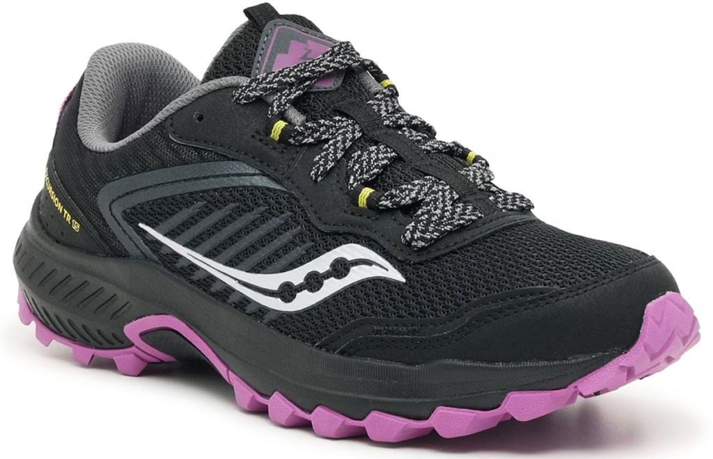 black and purple saucony trail running shoe