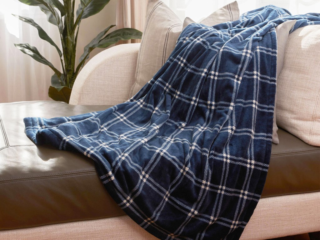 plaid throw blanket on couch