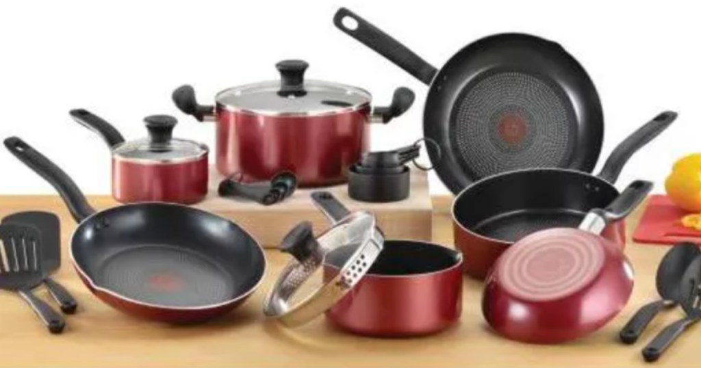 red cookware set on counter