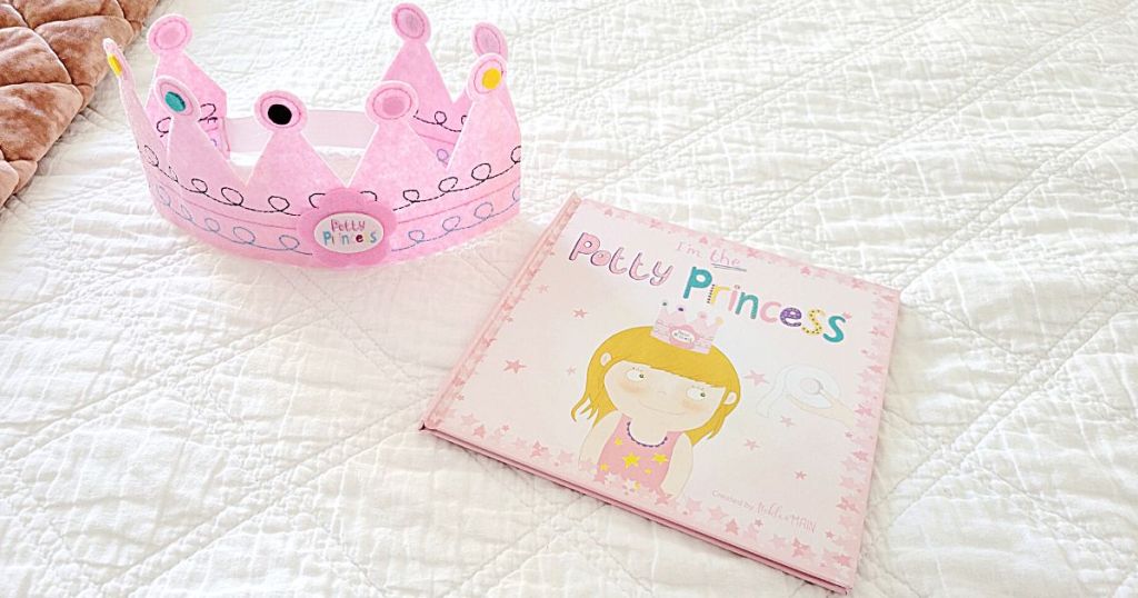 Princess Potty Training Book and crown on bed