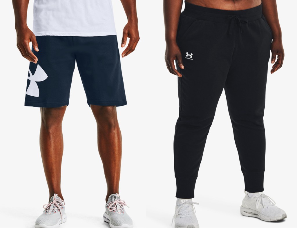 man and woman in under armour fleece bottoms