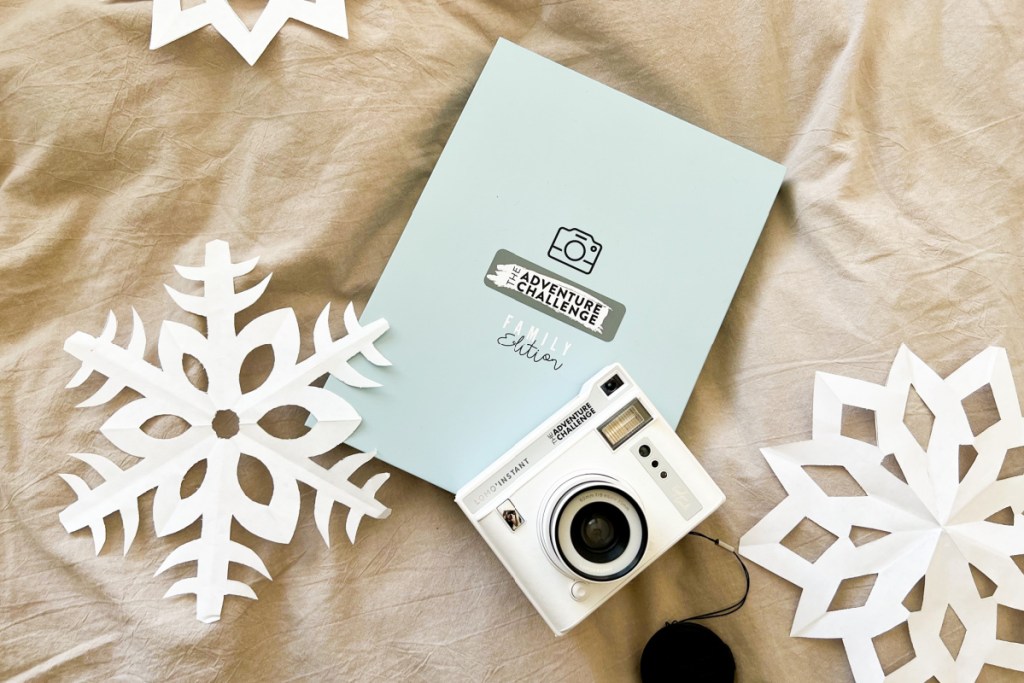 book camera and snowflakes