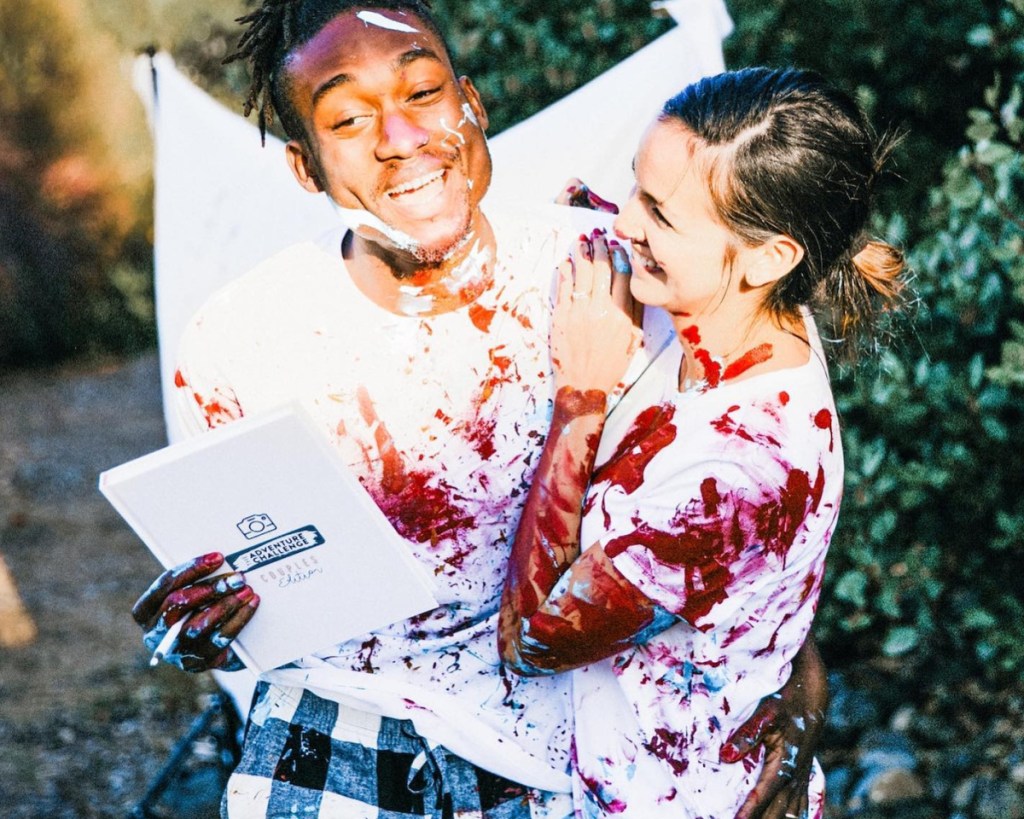couple covered in paint