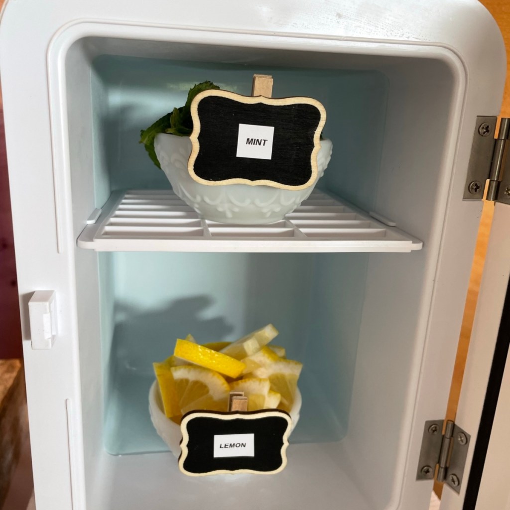 two mini-chalkboards labeling mint and lemon on mini-fridge