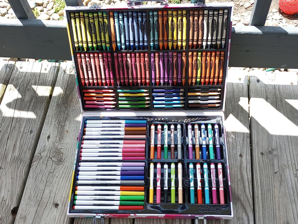 crayola art kit on a deck