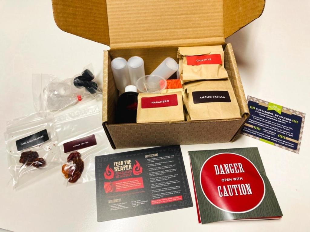 diy hot sauce making kit contents displayed in front of box