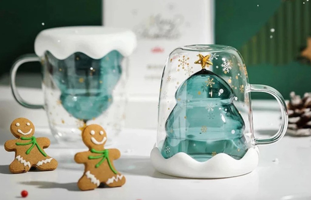 glass christmas tree mugs with snow rims and gingerbread cookies