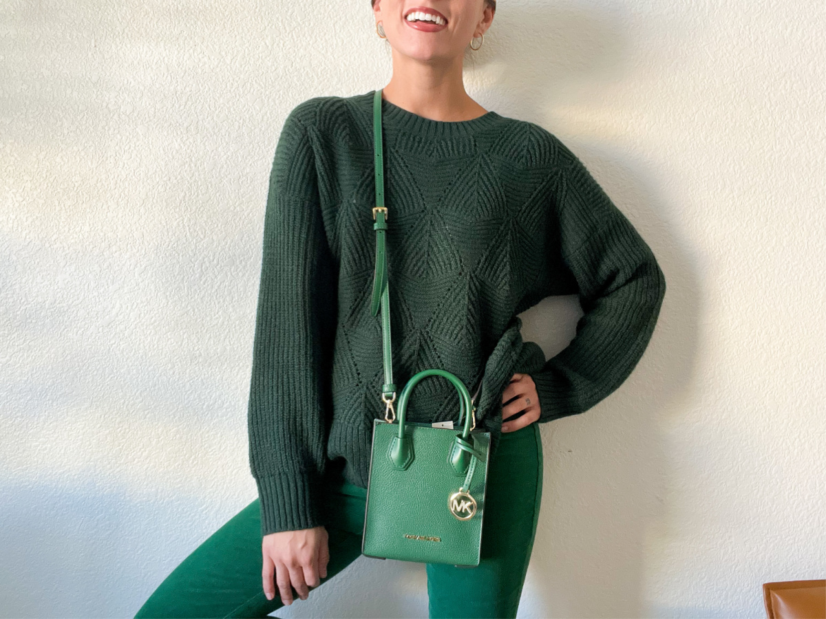 women with green outfit and green purse