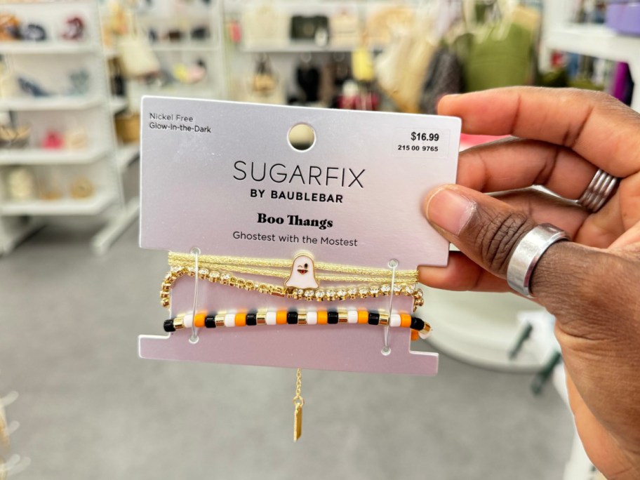 hand-holding-Boo-thangs-necklace-at-the-store أقراط SugarFix By Baublebar Halloween تبدأ من 13.99 دولارًا في Target | اختر من بين طن من الأنماط!