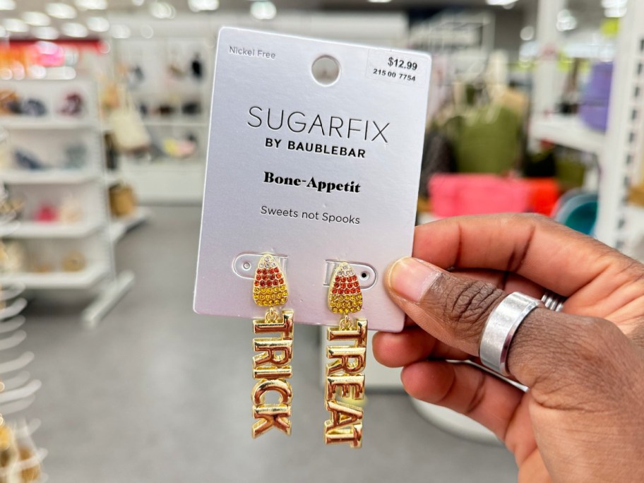 hand-holding-halloween-bone-appetit-earrings أقراط SugarFix By Baublebar Halloween تبدأ من 13.99 دولارًا في Target | اختر من بين طن من الأنماط!