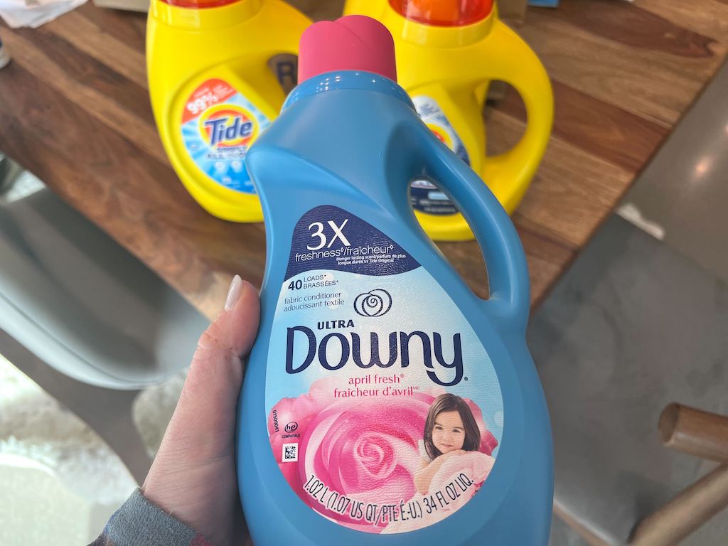 https://hip2save.com/wp-content/uploads/2022/10/holding-bottle-of-Downy-fabric-softener.jpg?resize=1024%2C768&strip=all