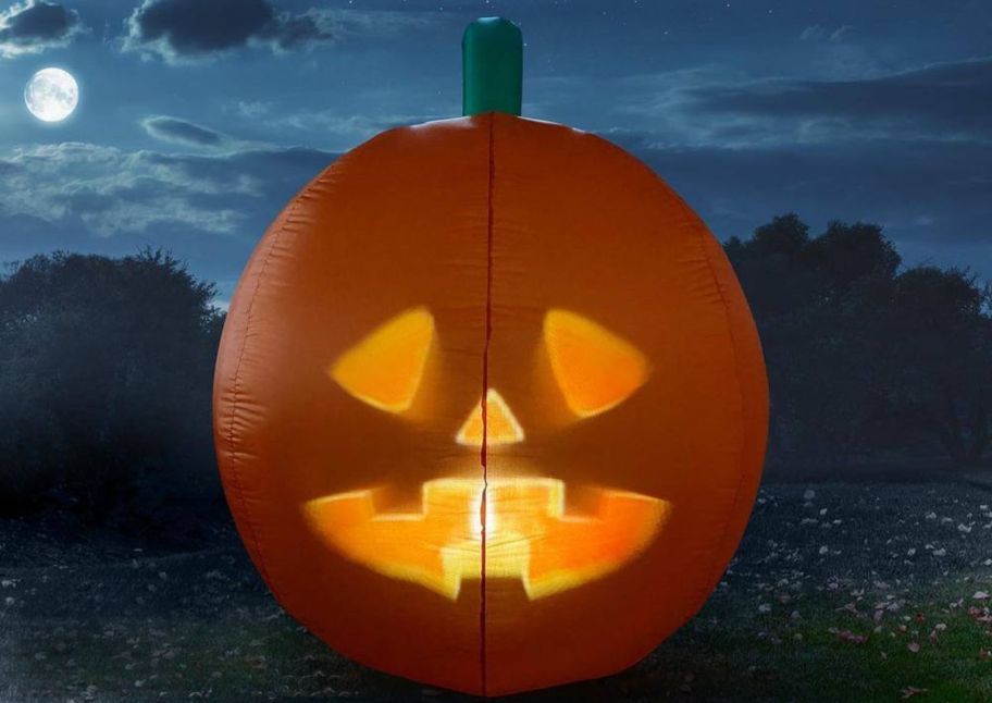 inflatable pumpkin in dark field