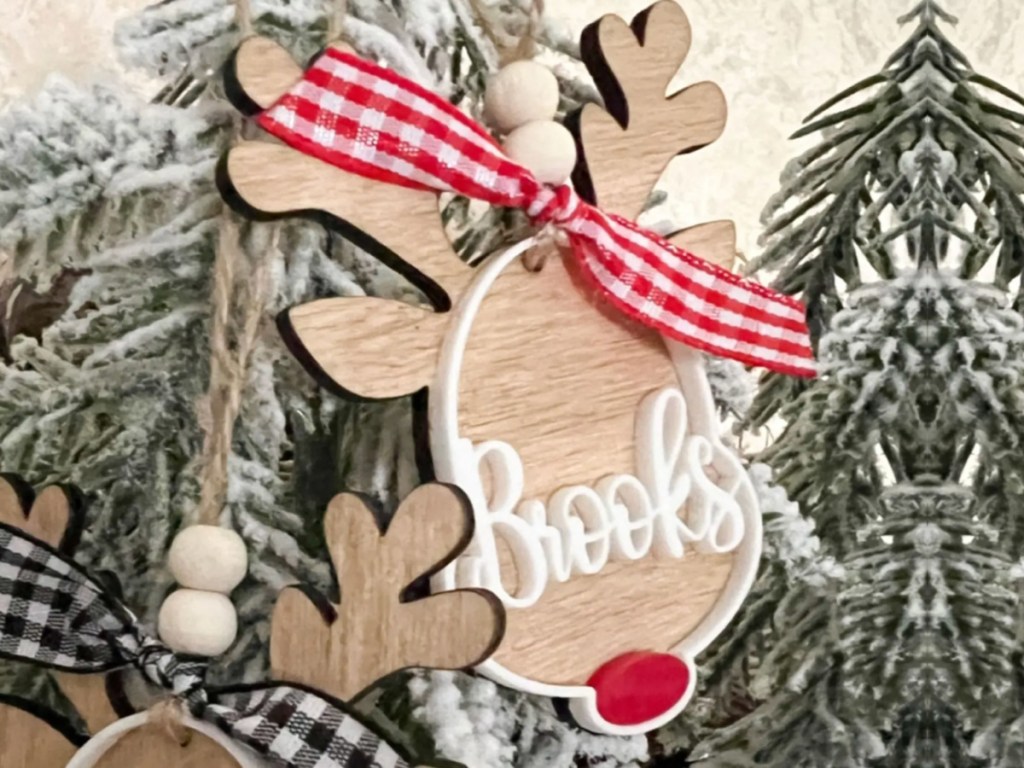 wooden reindeer ornament on tree