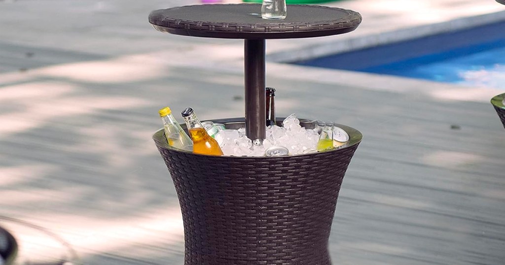 brown keeter table cooler with ice and drinks inside