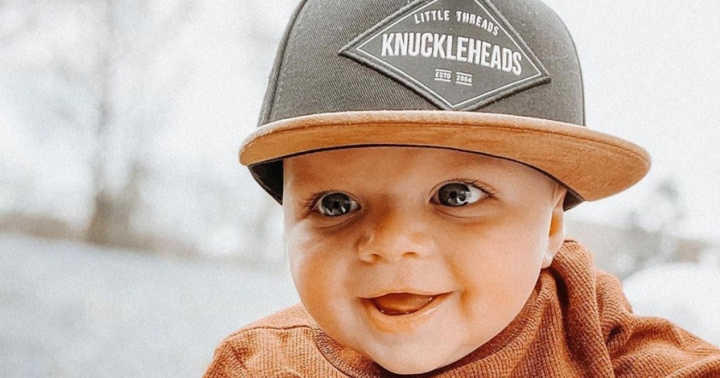 baby in trucker hat