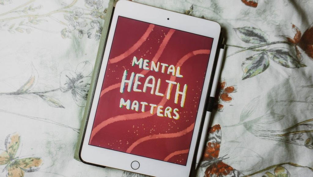 ipad with mental health matters on screen