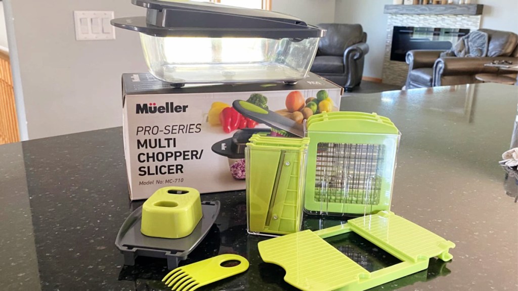 The Meuller 8 in 1 vegetable slicer shown here with attachments is one of the best kitchen gadgets of 2023