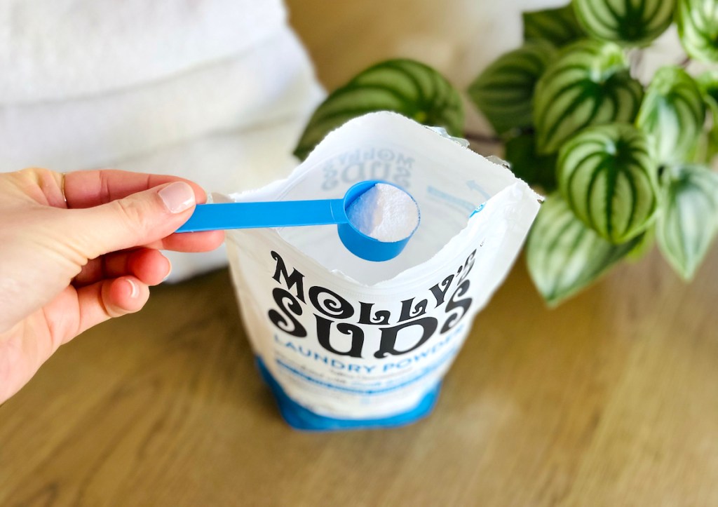 blue scooper from mollys suds laundry detergent bag