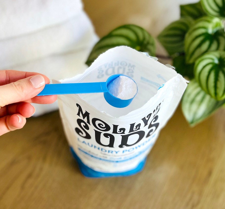 blue scooper from mollys suds laundry detergent bag