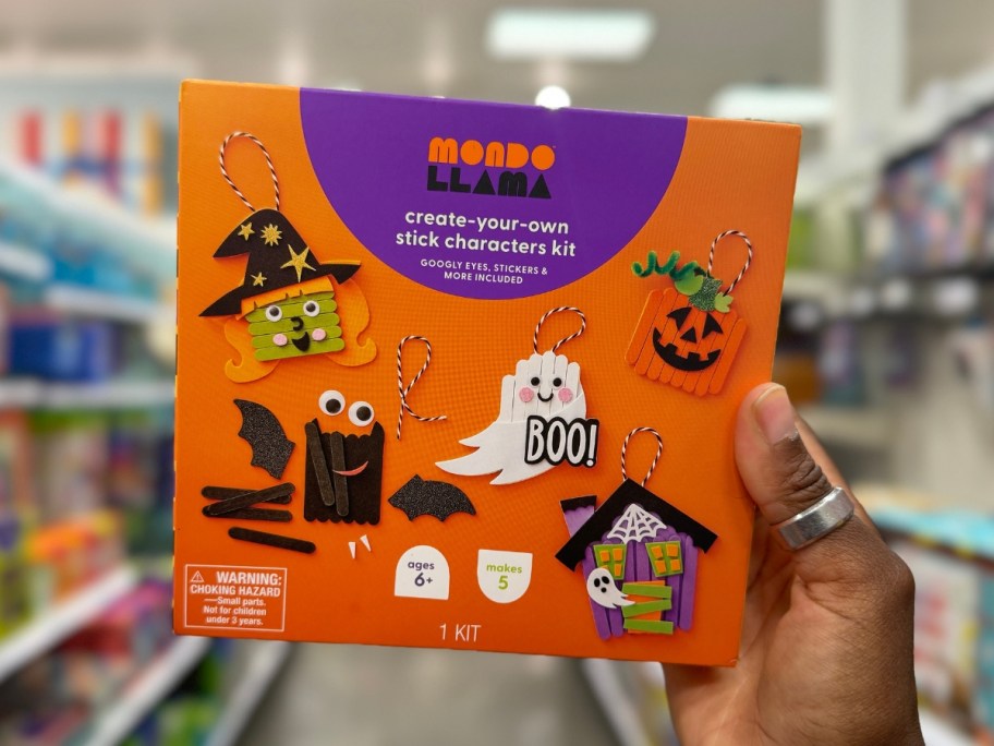 hand holding a Halloween Craft Stick Character Kit 