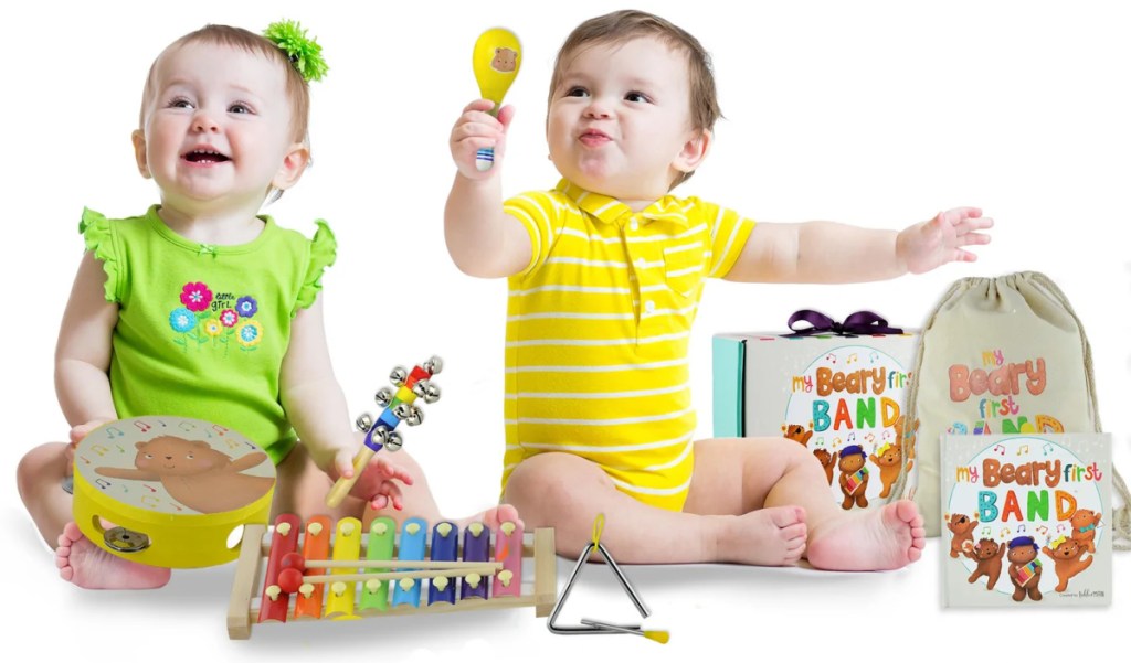 stock image of two babies playing with musical instruments gift set
