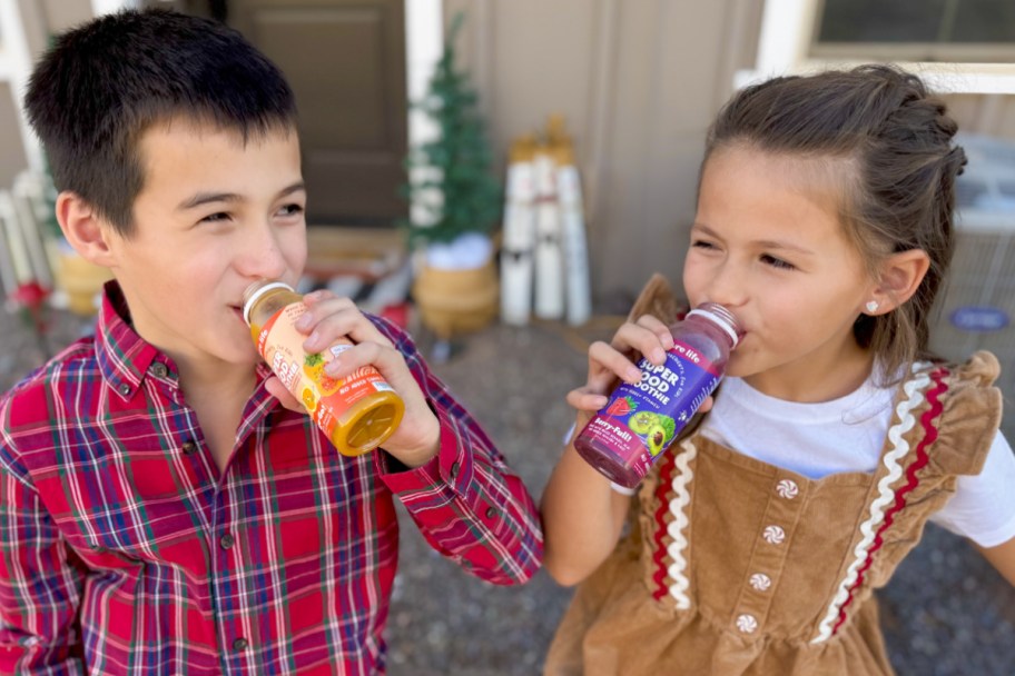 boy and girl drinking smoothies