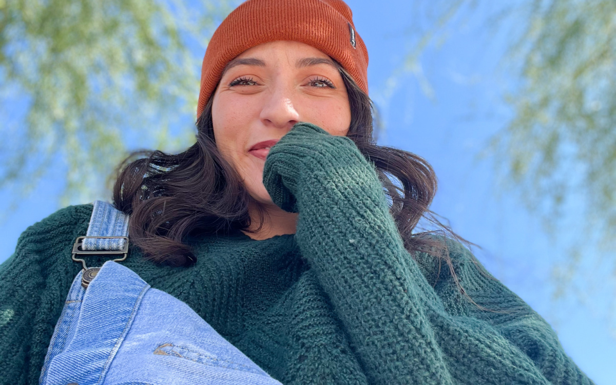 woman in beanie and sweater