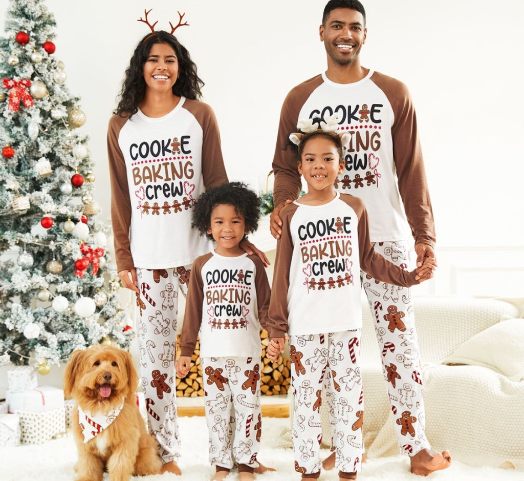 family wearing matching gingerbread pajamas 