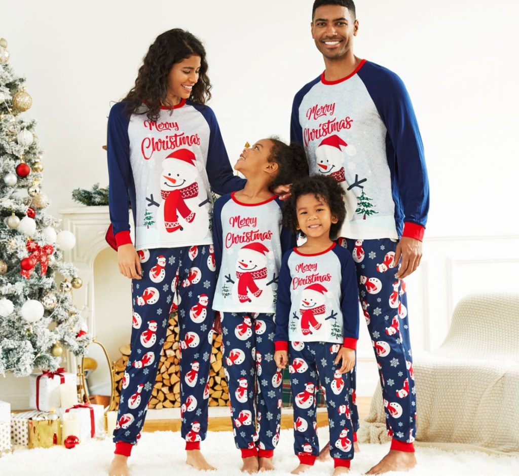 family wearing matching pajamas