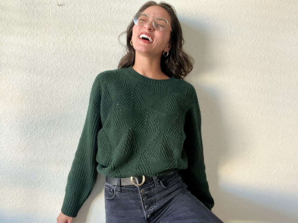 woman wearing green sweater