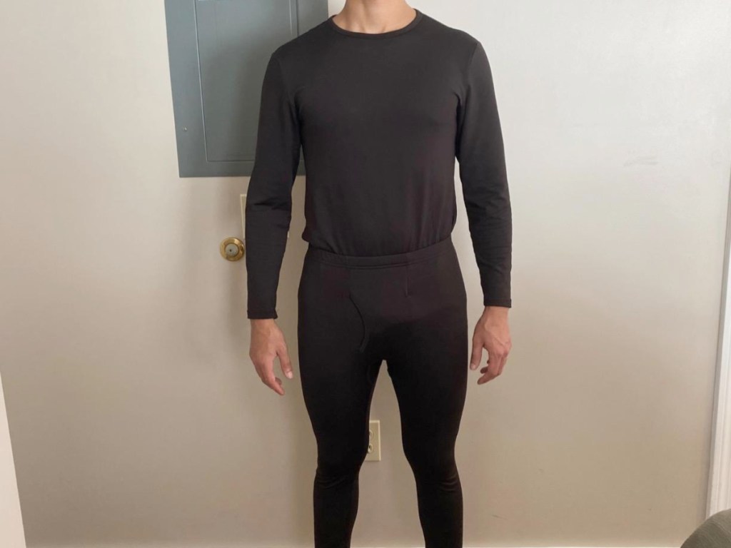 man's torso wearing black long underwear