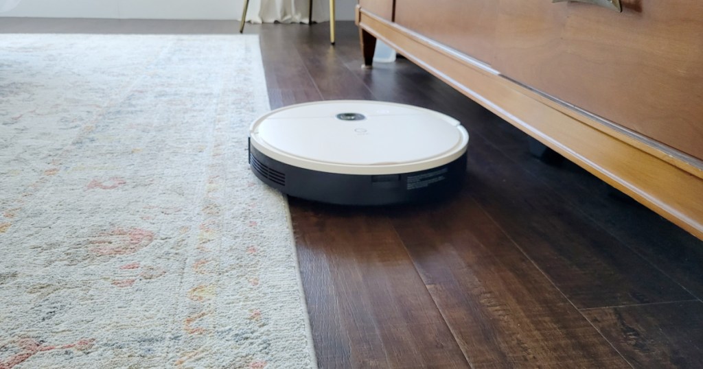yeedi vac x robot vacuum cleaning under a couch