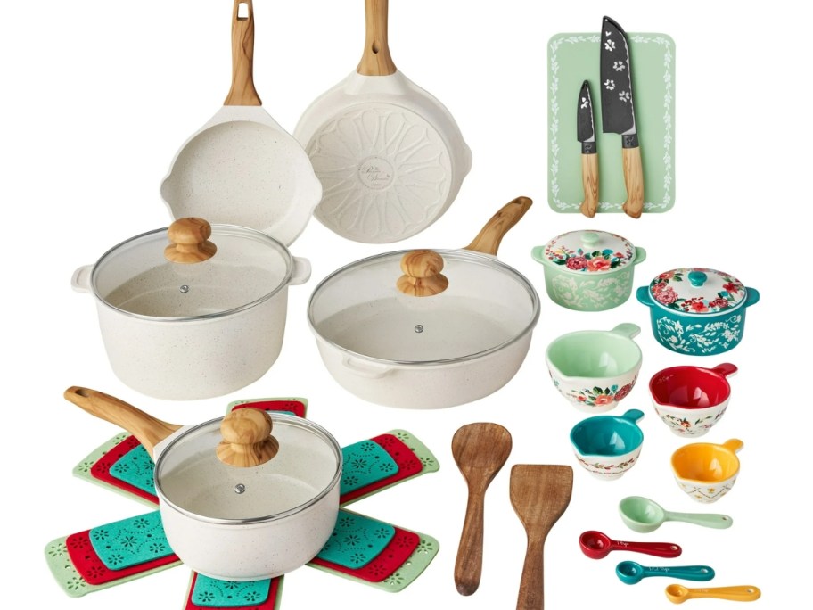 a set of cream and w coood okware with mixing bowls, wood kitchen utensils, mixing bowls and baking dishes on a countertop