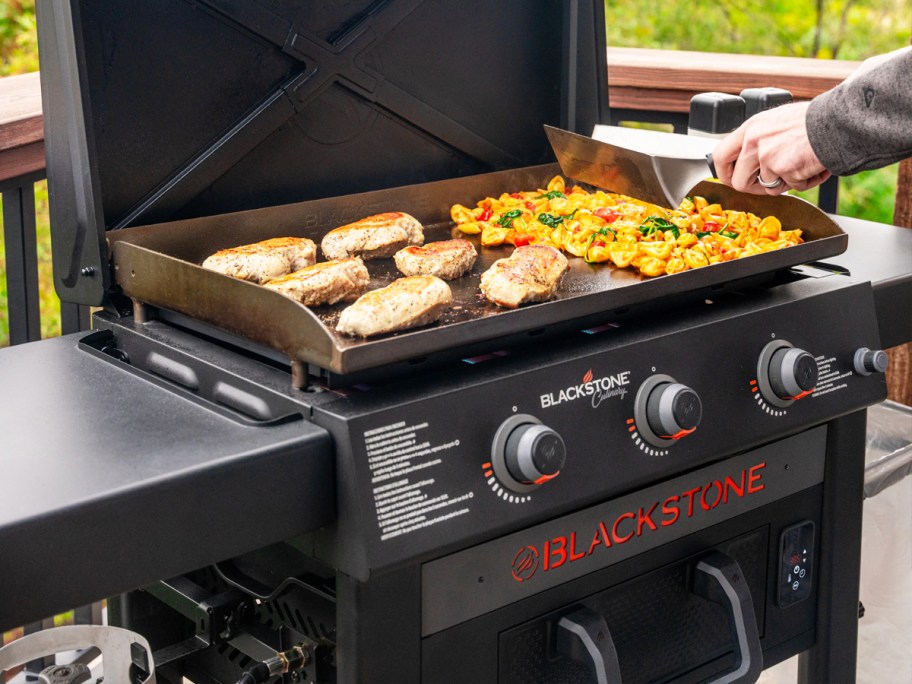 cooking chicken and vegetables on blackstone griddle