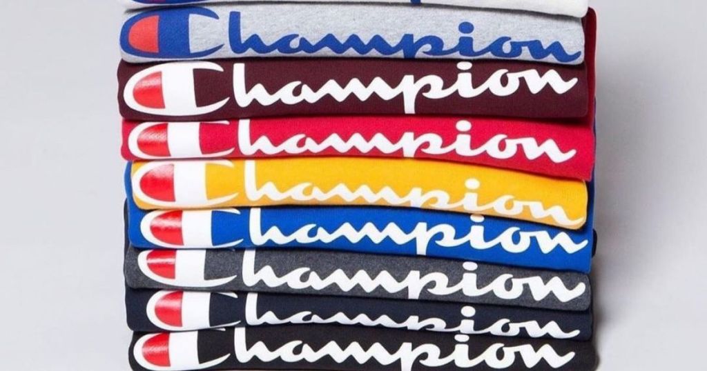 stack of folded Champion Tees