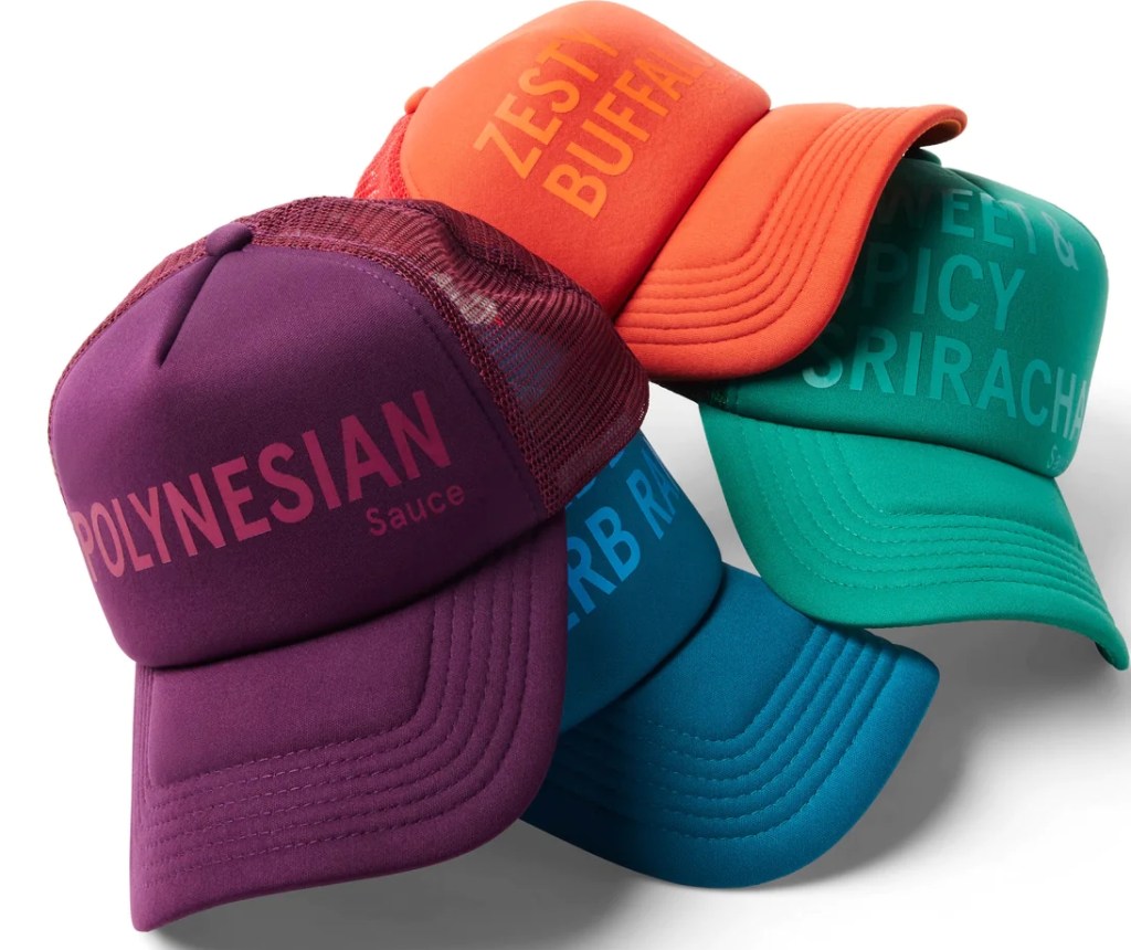 Stack of colorful trucker hats