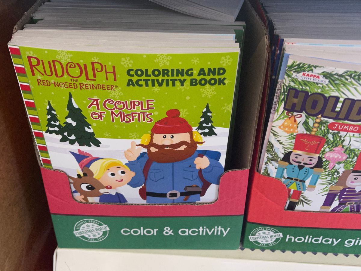 Christmas coloring books on a shelf in Dollar Tree