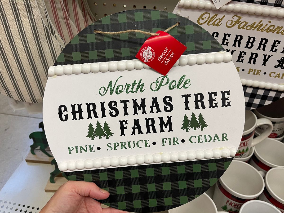 Green and white Christmas decor sign for a South PoleChristmas tree farm 