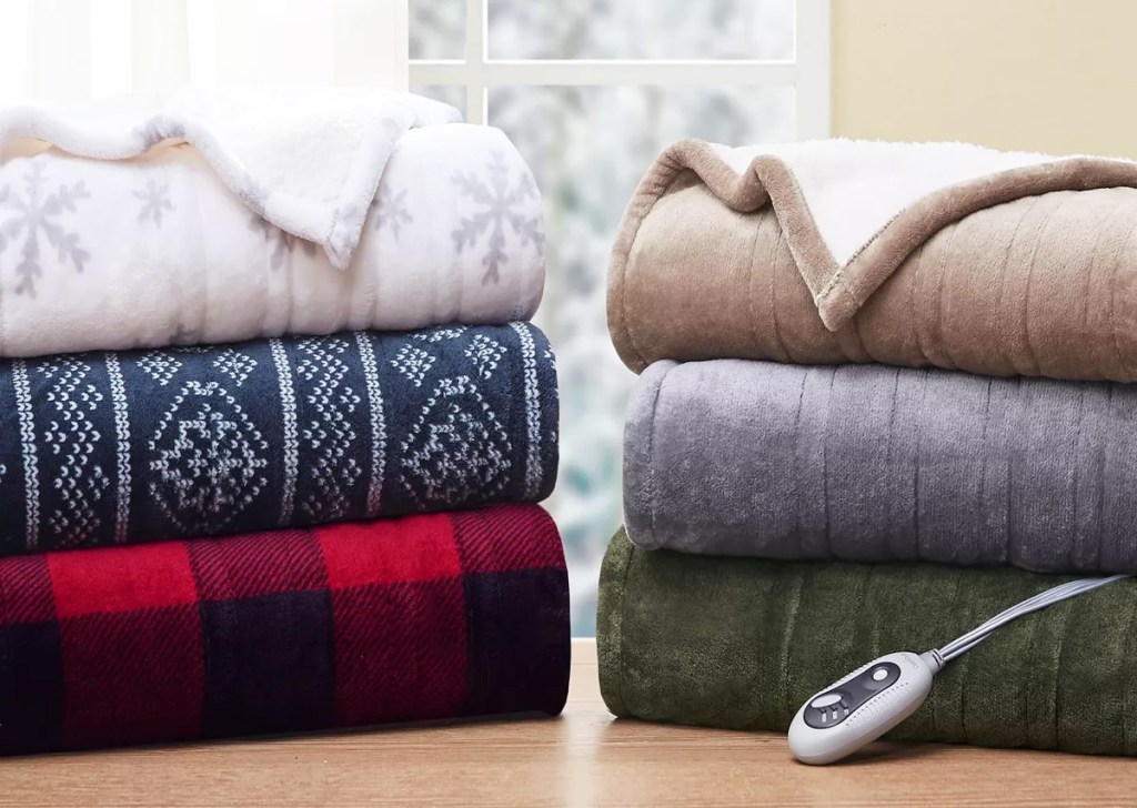 folded stacks of heated blankets